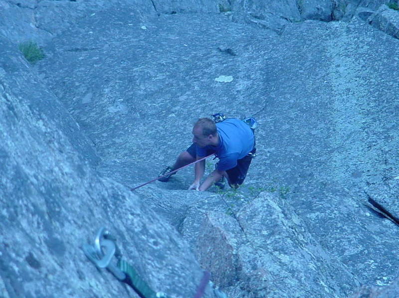 Brent Pohlmann following the first pitch of Disneyland. He is just below the crux.