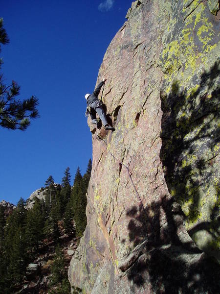 Starting the crux sequence past the 2nd bolt.<br>
<br>
Photo by Ken Heiser.