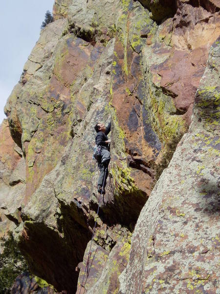 After the scary and dangerous step over the roof. The gear is a small cam in an expanding flake that is scary to pull on let alone put gear behind. The next gear is at the bottom of the photo. On TR a while back I saw a possibility of a brass nut to the climber's left at foot level.<br>
<br>
The climbing remains hard above this, but there is good gear in thin crack on the right after another move or two.