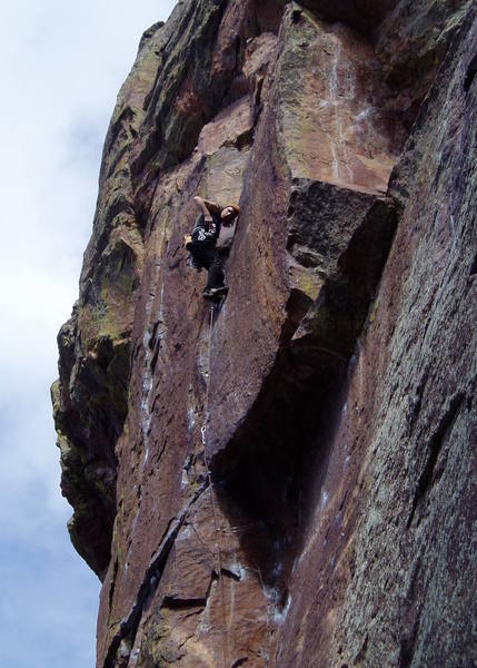 At the hand jams in the middle of the 10 upper crack. Save a hand-sized cam for here--a #2 Camalot works.
