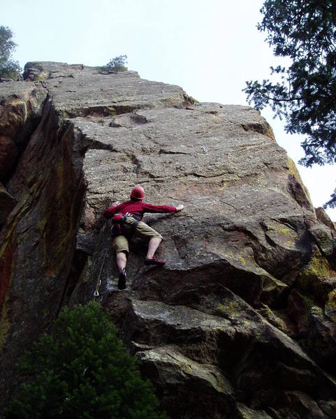 After the insecure move around the arete. Move a bit further right then do several difficult thin moves up to the next bolt. Then move right again to easier climbing. The moves up were the crux for me (rather than the moves around the arete).