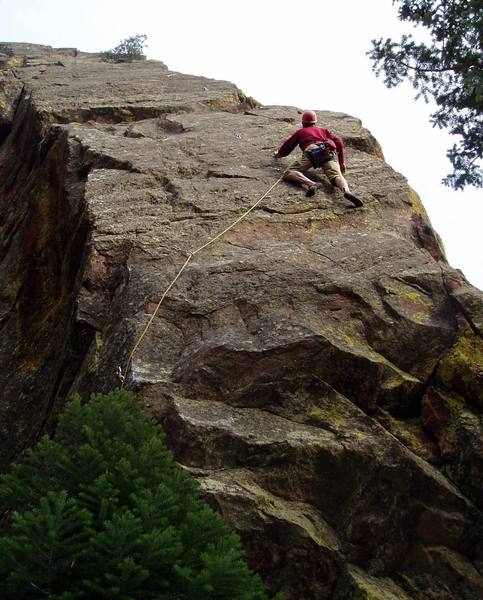 On the easy but fun climbing. The climb moves right towards the arete, up and then eventually back left to the anchors.
