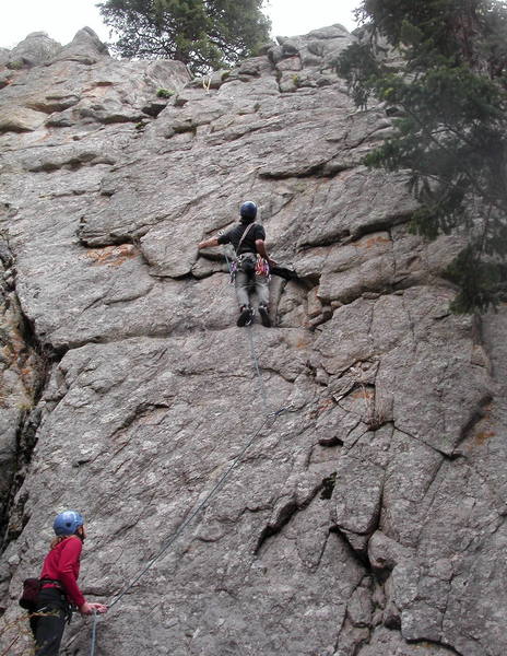 Mike Amato contemplates the committing crux moves on Dead Again. Marga Powell is belaying.
