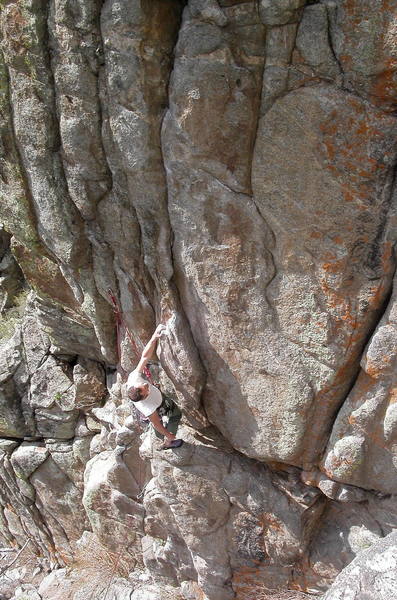 Richard Rossiter at the start of the overhanging crack on Dominator.