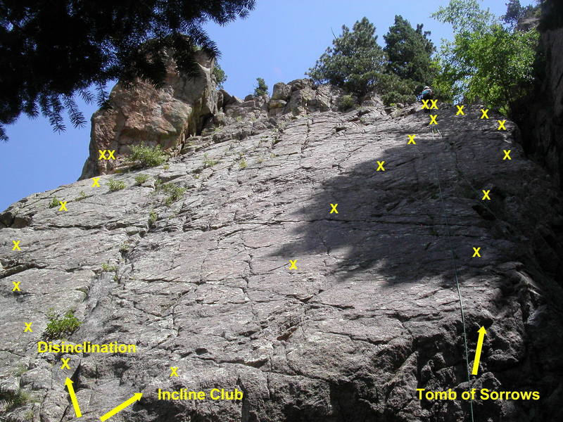 Routes on the Avalon slab. Incline Club and Disinclination start in a right-facing dihedral below the slab; Tomb of Sorrows starts at the right side of the slab, up the arete or in the chimney.<br>
<br>
Flashpoint starts in a corner left of the anchor atop Disinclination.