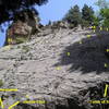 Routes on the Avalon slab.  Tomb of Sorrows starts on the arete or in the chimney to the right.  Incline Club and Disinclination start in a right-facing corner below the slab.