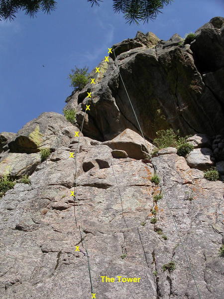 The Tower. The crux is at the fourth bolt, with poor footholds and a long reach to insecure handholds. This may be 5.9 if you're tall, but it's 10a or harder if you're short.<br>
<br>
A second crux is stepping right into the V-corner at the eighth bolt.