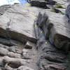 The Touch.  The crux upper face can be climbed left or right of the bolt line.