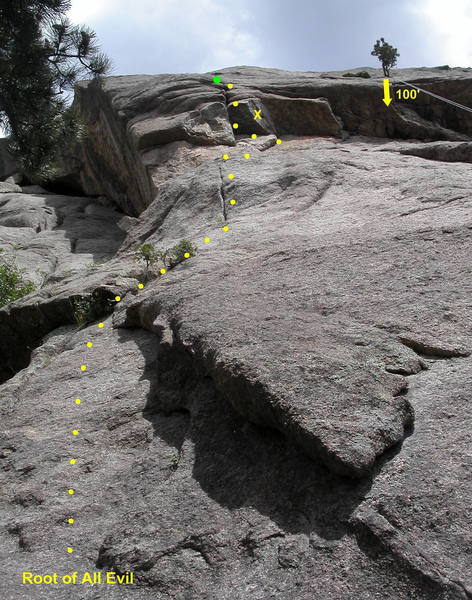 The first pitch of Root of All Evil. The hardest move is at the steep thin crack halfway up. The roof, protected by a bolt, has good edges for both hands.<br>
<br>
From the top of the first pitch, Root of All Evil continues straight up a thin crack and Sibling Rivalry angles left up the slab.<br>
<br>
Also shown is the rappel tree atop Sweet Sabrina, which can be used as a descent from the top of Sibling Rivalry.