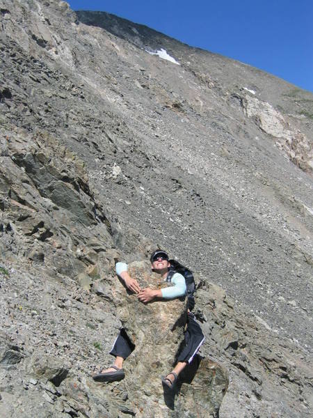 Me hanging onto a short spire for dear life. Not necessary. We climbed the whole route in Tevas. Blow it out your ear!
