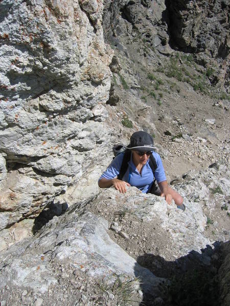 This is the "chimney" section that CAN go at 5.3 if you climb the face that Sally's on, or 4th class if you ascend the chimney-proper. Again, this feature can be avoided. Just look around.