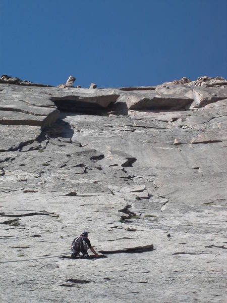 Mike leading the fourth pitch, just about to head up the abundant loose flakes.
