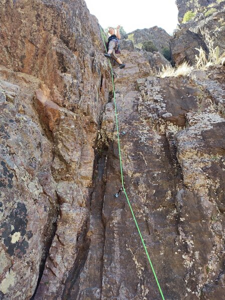 Petra  leading the first route she ever climbed. City of Stone  and breaking in her brand new rope.
