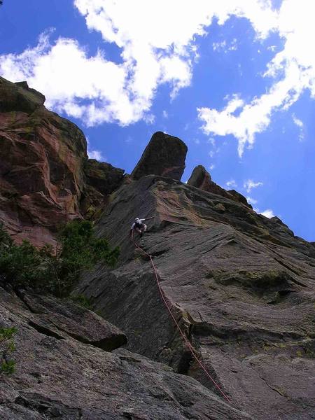 At the 5th bolt...which happens to be the lone bolt that is difficult to clip... enjoying the reassurance of a positive arete for a rest after clipping