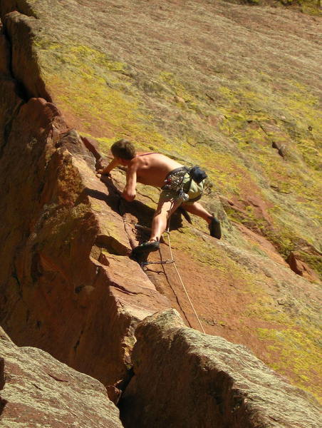 Eric cranking the difficult move above the pedestal.