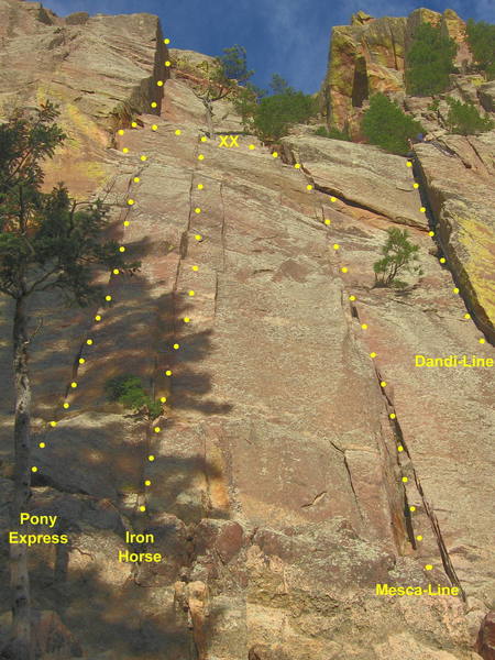 Routes in the Pony Express area. Pony Express takes the leftmost crack line above two trees and jogs right to a 2-bolt anchor. The second pitch continues up the dihedral above.