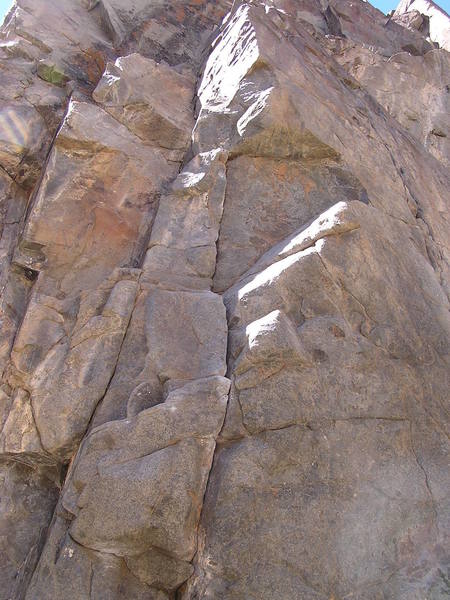 The route's overhanging crux...
