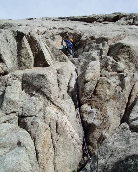 This looks like a reallly big climb in this photo. Ran is approaching the upper slab. We did the direct start, the first move of which is much harder than it looks at maybe 5.8. The regular route starts higher to the right.
