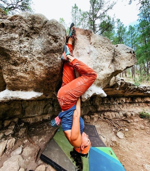 Climber Idaliza Sosa with an invert top out. Photo by Ashton Searing