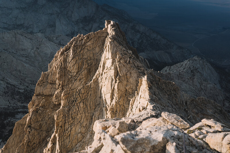 Looking back down at the main tower as I belay my partner up the ridge