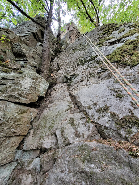 (1) Move up the middle of the slab to a large open ledge
