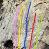 The center most routes on The Main Wall, from left to right:<br>
<br>
'Russell In The Wind', 5.10a (Pink)<br>
<br>
'Electric Puppy Machine', 5.10d (Yellow)<br>
<br>
'Welcome To Bald Eagle', 5.10d (Blue)<br>
<br>
'Paper Tiger', 5.10d (Red)<br>
<br>
'Critical Mass' 5.11c/d (Green)