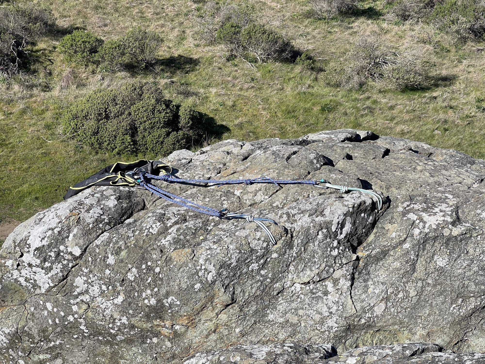 Top Rope quad anchor for the south crack / left arete. Made with 30' of