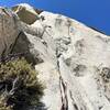 P1/2 variation. Belay in the right facing corner below the arete, and follow the cool traversing finger crack directly above towards the roof.