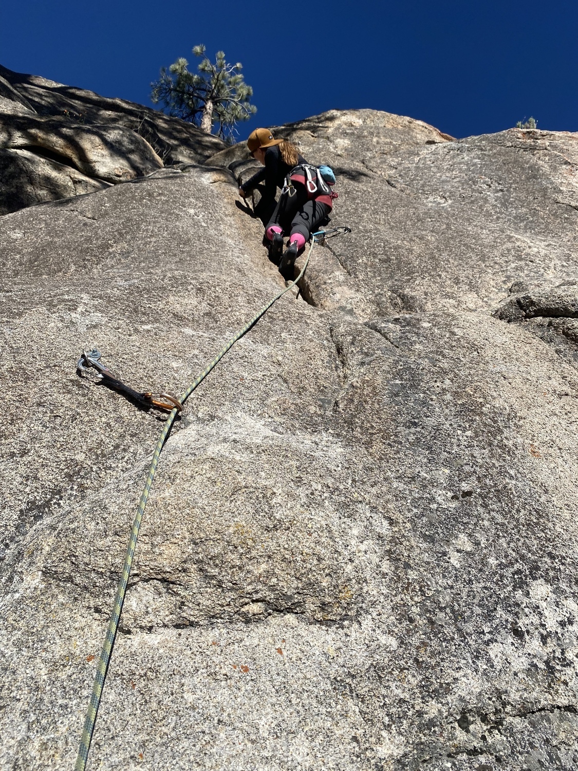 The route is a sport climb now. Goes R to a 2 bolt anchor instead of