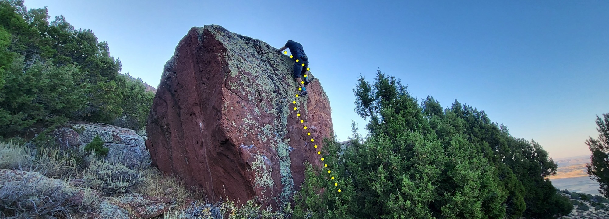 Start on the right front side of the boulder, diagonal up and left to