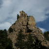 The Sentinel from CO Hwy. 7. Crooked Cross is the obvious crack to the right. Fogline is around the corner to the left.