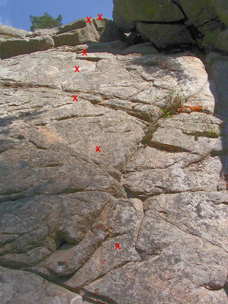 Marquis de Sade. The crux is the slanting finger crack above the fourth bolt.