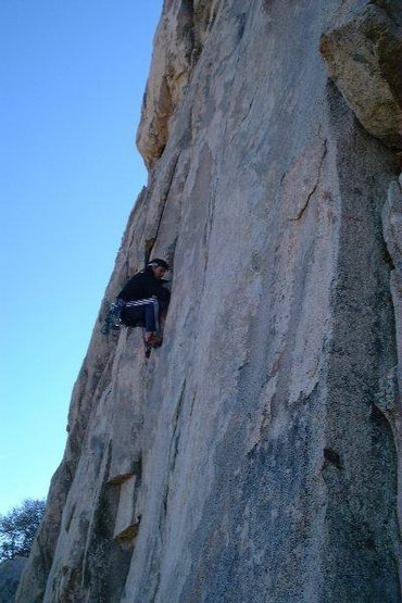 Sebastian about 10 feet past the crux