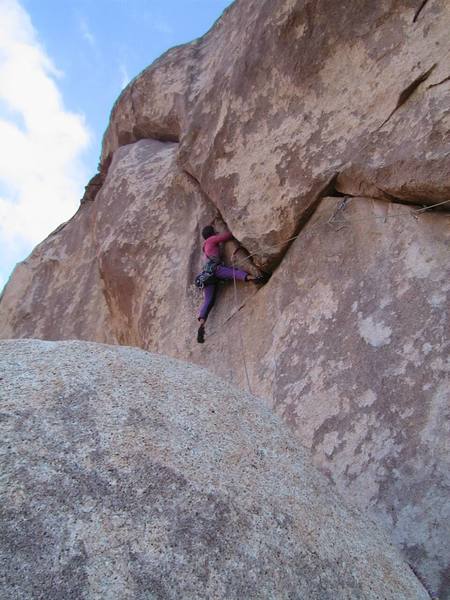 Just past the first crux...getting ready to enter the long arching crack. Photo by HHH
