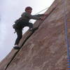 Christa Cline laybacking the top of the flake before stepping left onto the face.