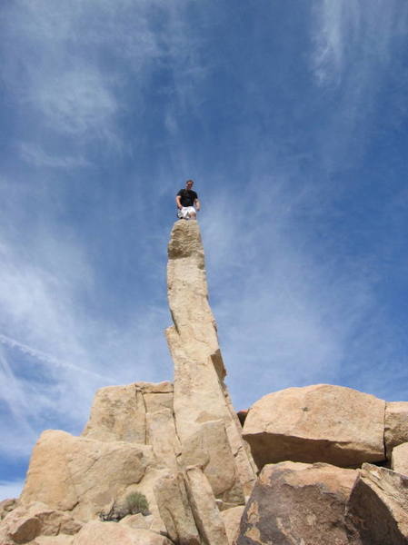 Ryan Avery on top of the outstanding free solo Aguille De Joshua Tree