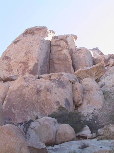 To the right of the obvious dihedral is the entrance to the small cove where the other routes are located. Photo by H. Harris on 10/12/03