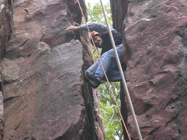 Bob squeezing up Chimney's End.