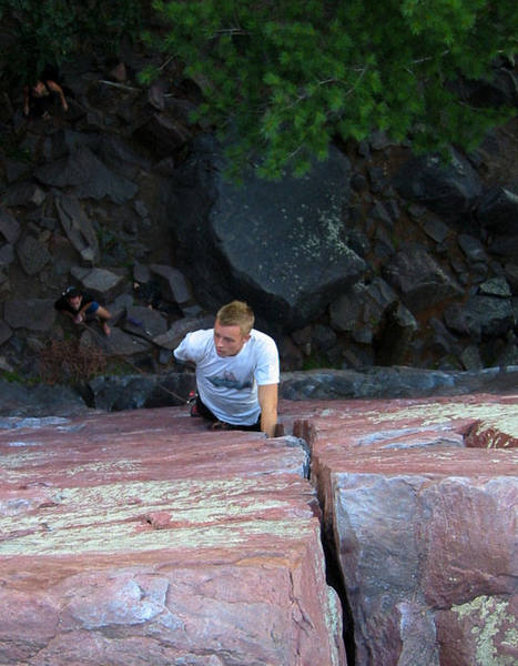 Travis Melin high on Birch Tree crack 5.8. Photo Mike Lopera.