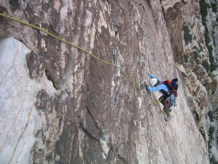 Janet working out the thin moves on the awesome P5 traverse.