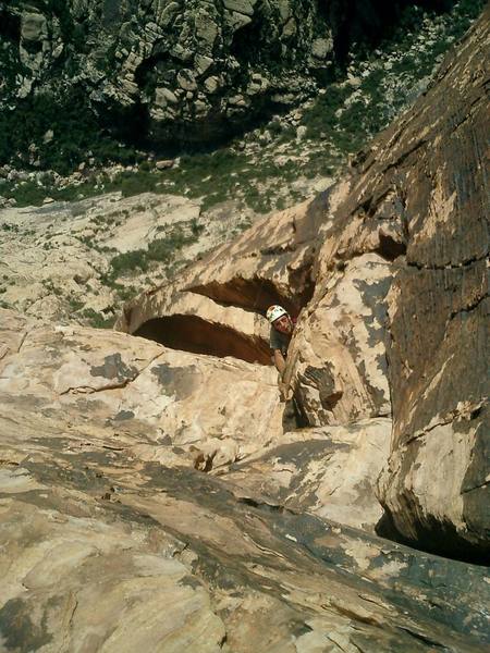 This was the crux if I remember - here's Bruce pulling around the corner and up out of the chimney. These were taken March or April 2004. We took the Solar gully descent (I think - 2nd gully on the right) - it was wilder and spicier than the climbing but beautiful!
