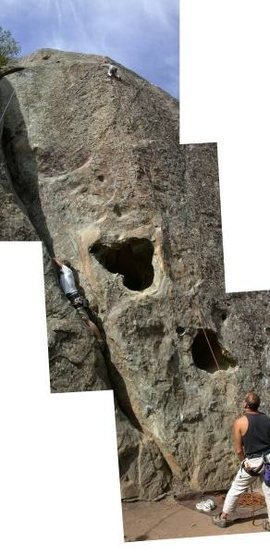 Amazing face is to the right of the crack (that's my little brother on the left!)