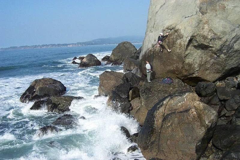 Paul checking out the tide while Justin works the crux sections.