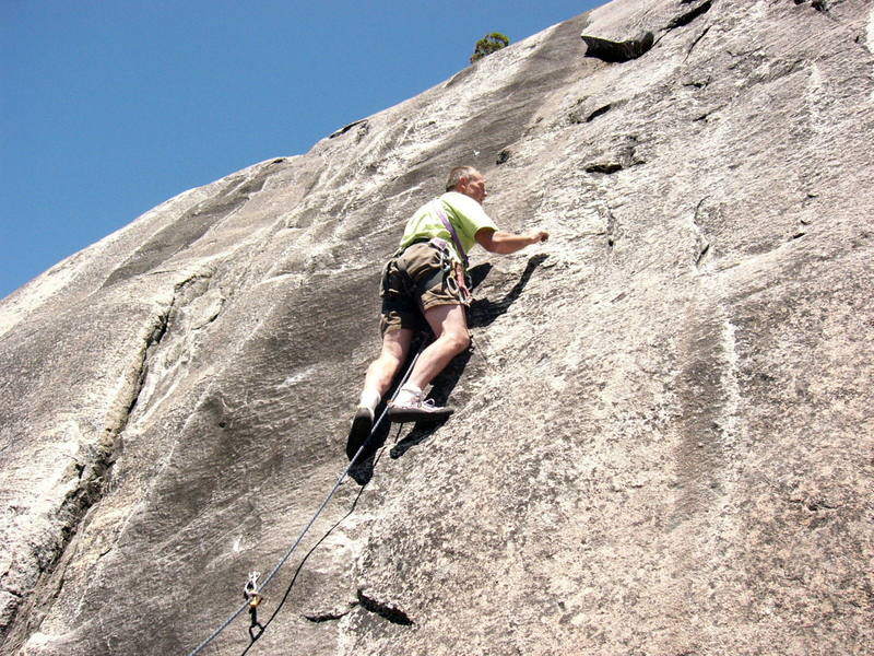 Paul climbing past the first bolt. The second bolt is way up there above Paul's head!