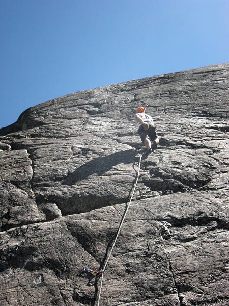 Brad looking relaxed getting ready for the steeper face above.