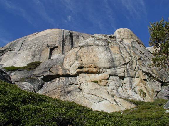 Mid Dome from just above the Pacific Crest Trail. The rock in the forground is not Mid Dome, Mid Dome is the one with the streaks that sits behind this front rock.