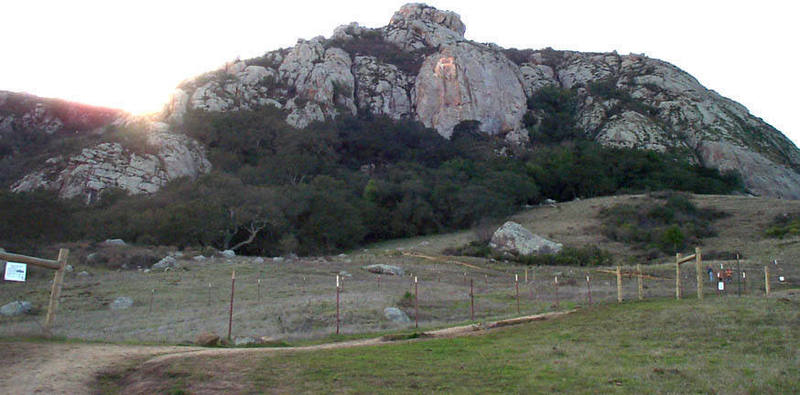 Bishop Peak, from left to right: Cracked Wall (below setting sun), Jam Crack Wall, Garden Wall, Summit Blocks (high point), P Wall (obvious "P"), and Shadow Rock (lower right slab).