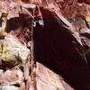 Tony on 'Self Abuse' (10c) on the Hawk Eagle Ridge of Eldorado Canyon. Image by Joseffa Meir, ~2001