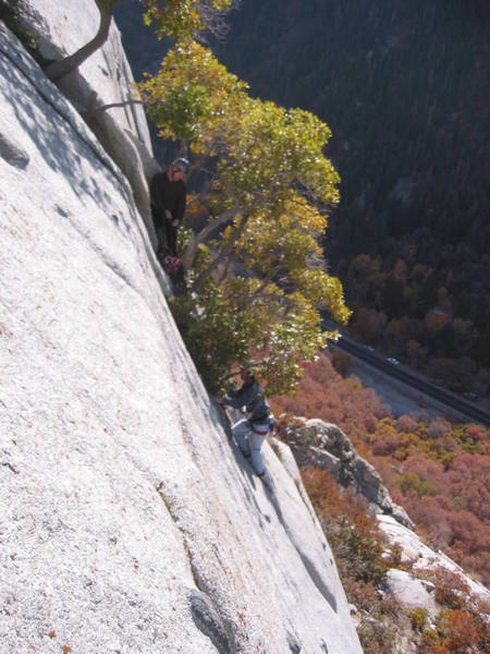 Looking east at some guys on the top of the first pitch of Bushwhack Crack.