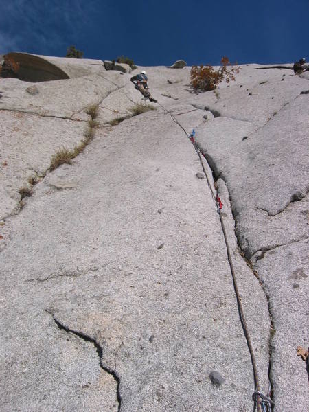 Near the top of the 3rd pitch of Schoolroom.  Nice clean finger crack!